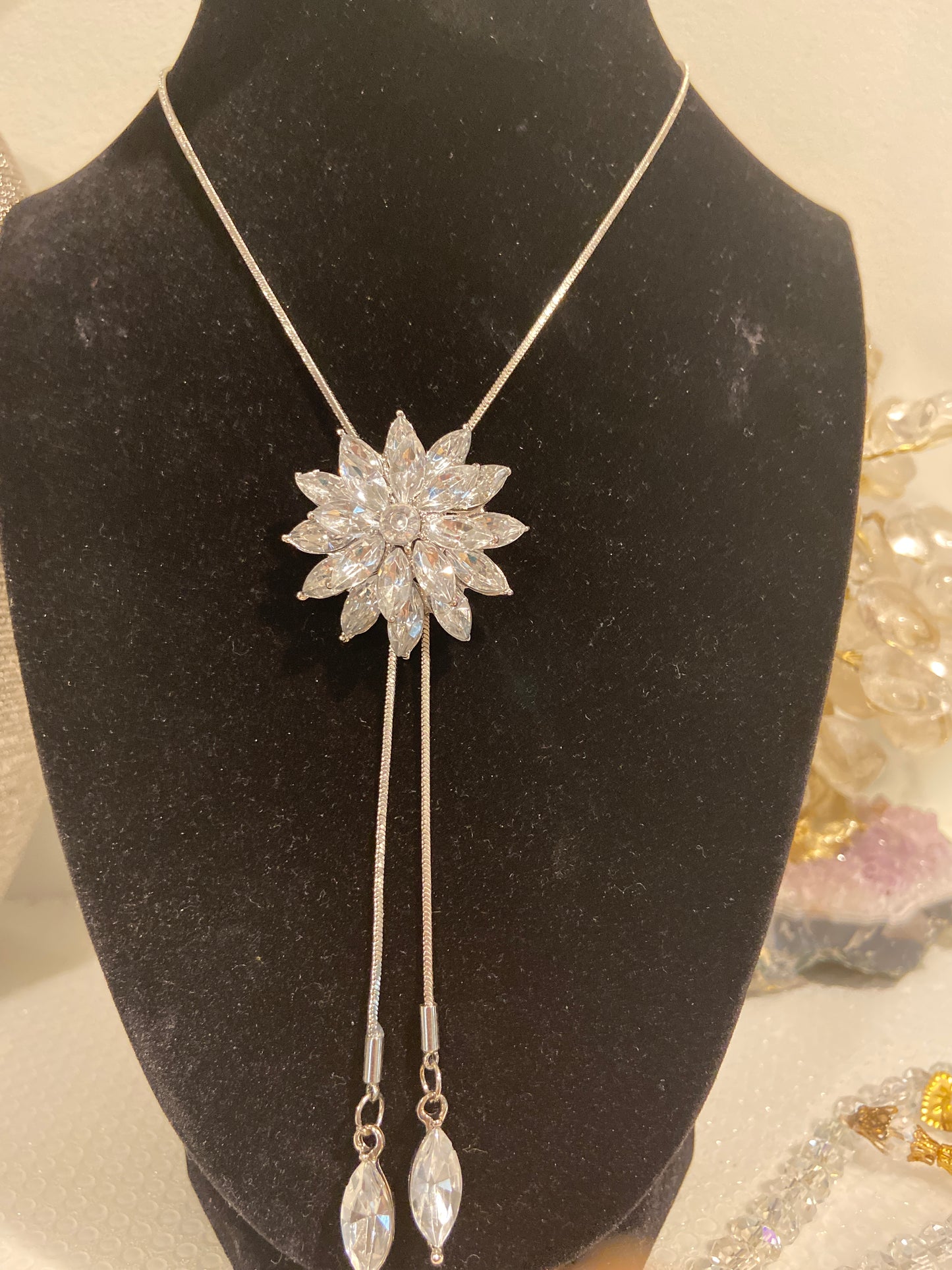 Elegant Long Silver Chain Style Necklace with Star shape Crystals .