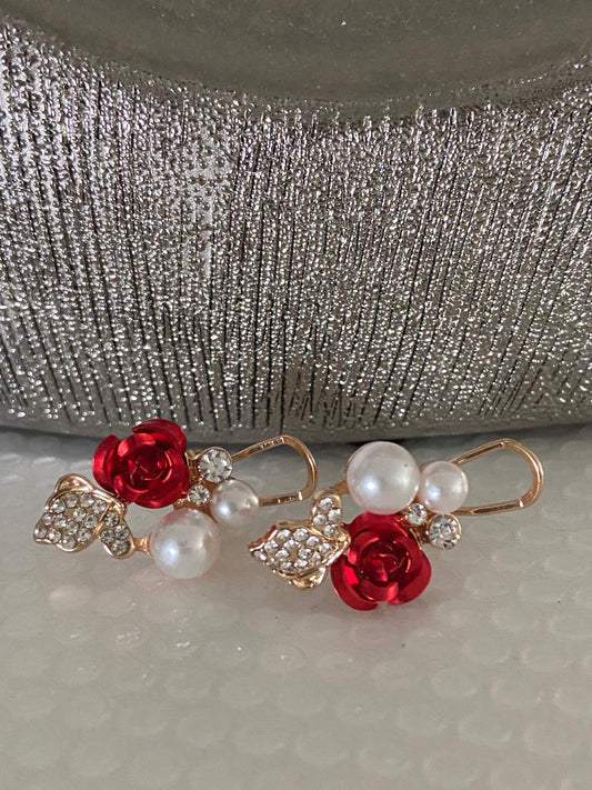 Gorgeous rose shape Earrings with white pearls.