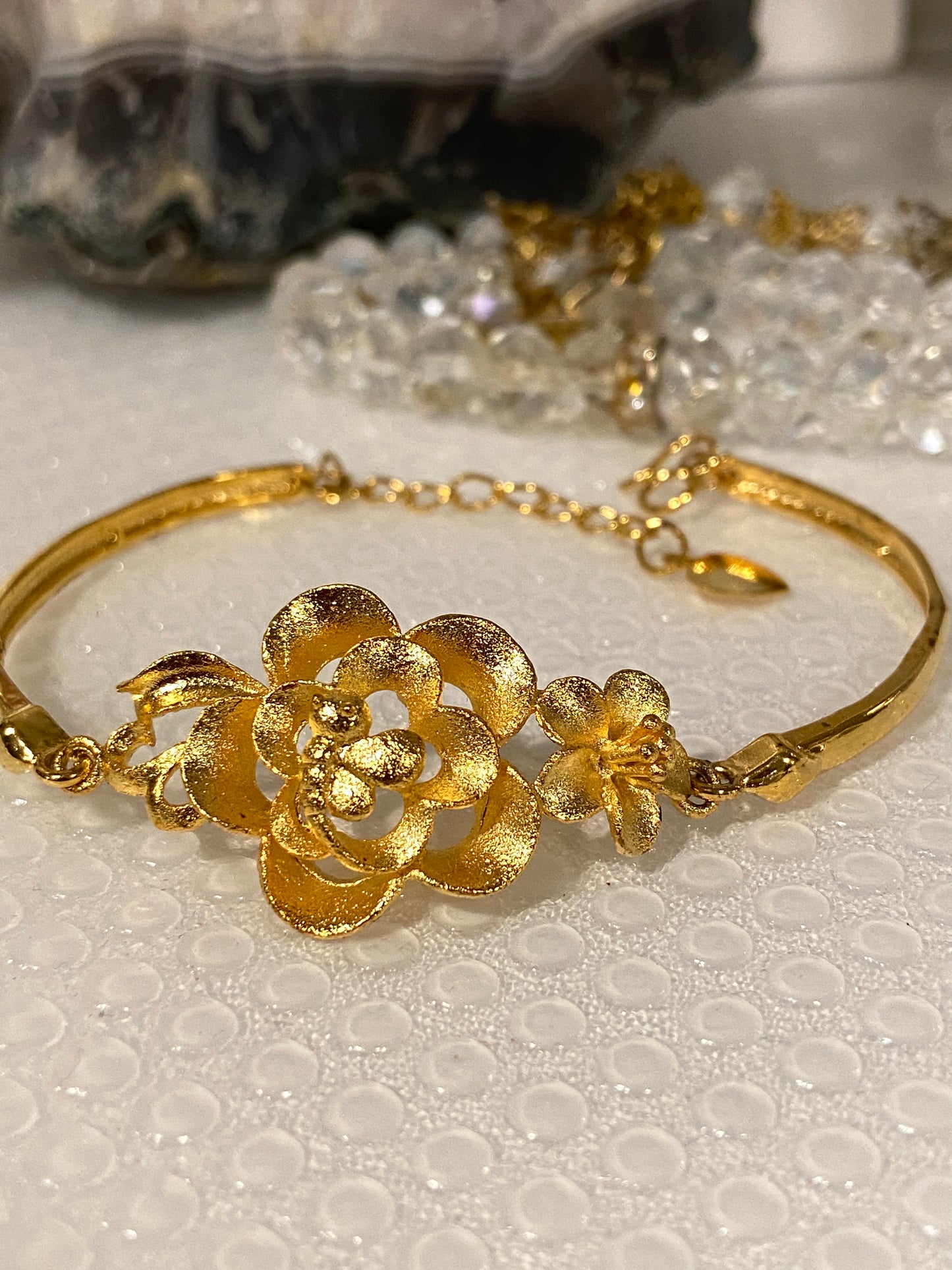 Elegant Floral Gold Tone Bracelet with Extension Chain.