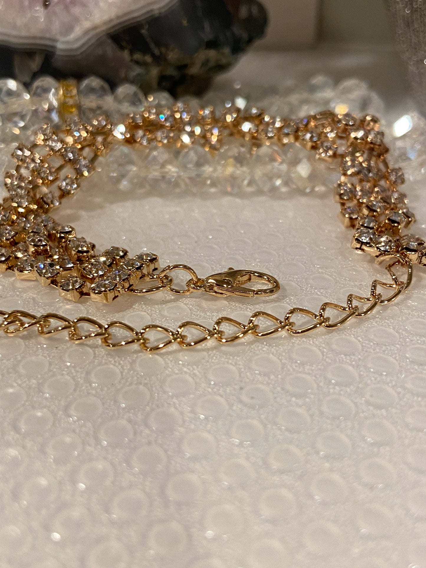 Luxurious Sparkling golden Bracelet with shiny Crystals.